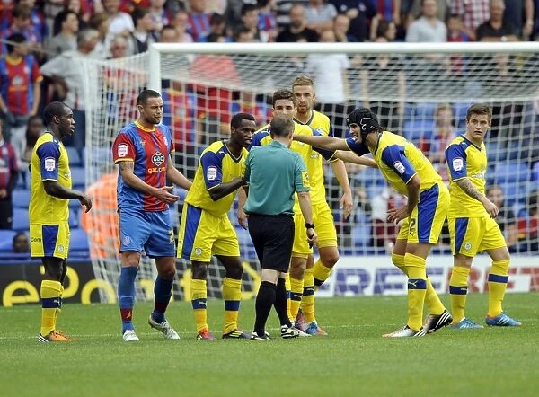 Crystal Palace v Sheffield Wednesday... Confusion as the Referee Mr Lewis first gives Palace a penalty then reverses his