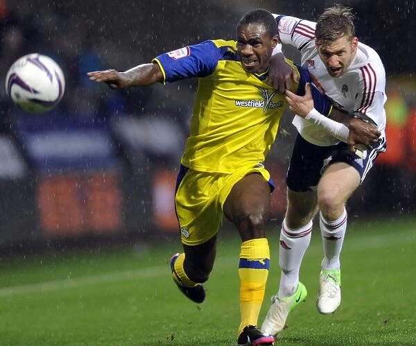 Bolton Wanderers v Sheffield Wednesday... Owls Michail Antonio held back by Boltons