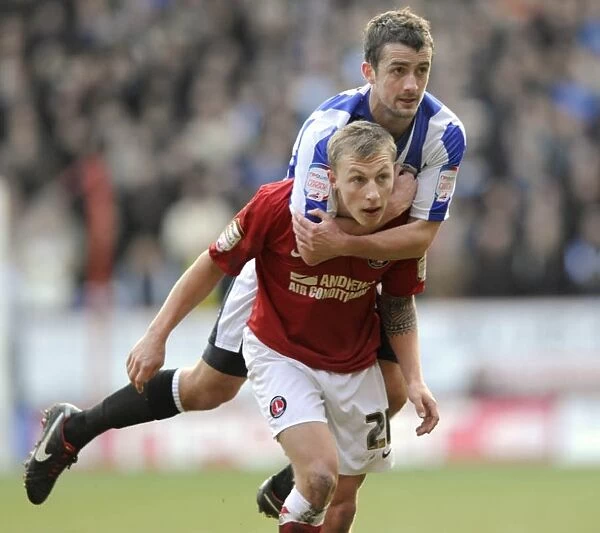 Charlton v Owls....Owls David Pugh on his debut gets to grips with Athletics Chris Solly