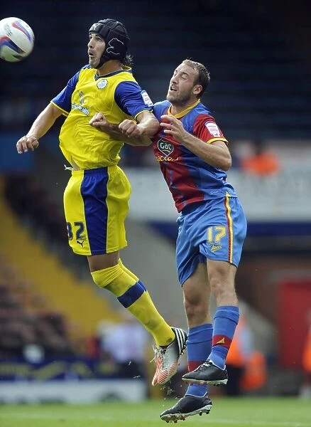 Crystal Palace v Sheffield Wednesday... Owls Miguel Llera with Palaces two goal Glenn Murray