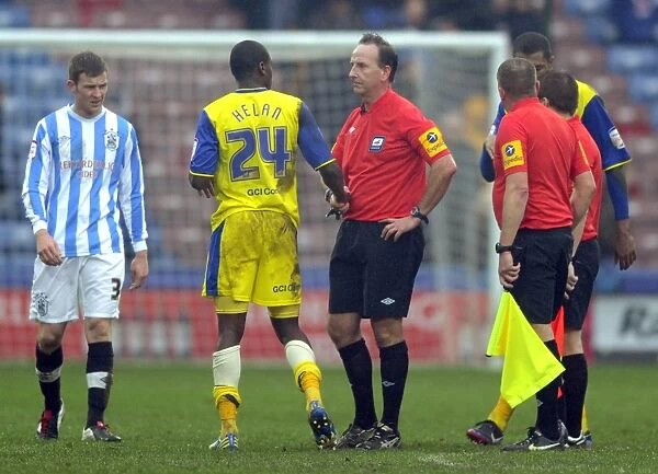 Huddersfield Town v Sheffield Wednesday... Owls Jeremy Helan shakes hands with Referee
