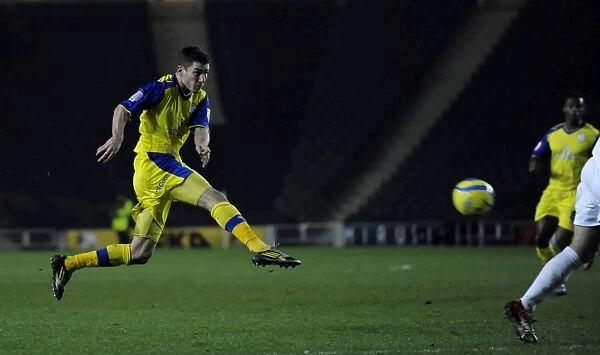 MK Dons v Owls..Lewis Buxton fires in a shot