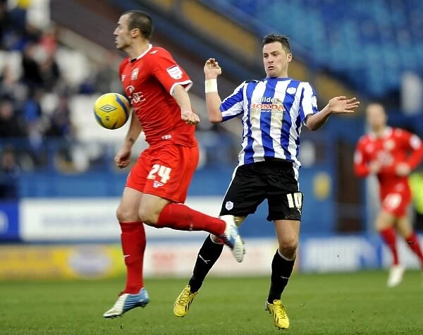 Sheffield Wednesday v MK Dons... Owls Chris Maguire with Anthony Kay