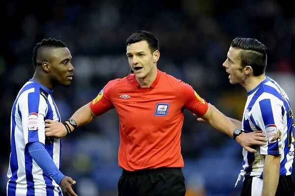 Sheffield Wednesday v Wolves... ref Andrew Madley with Owls Jermaine Johnson and