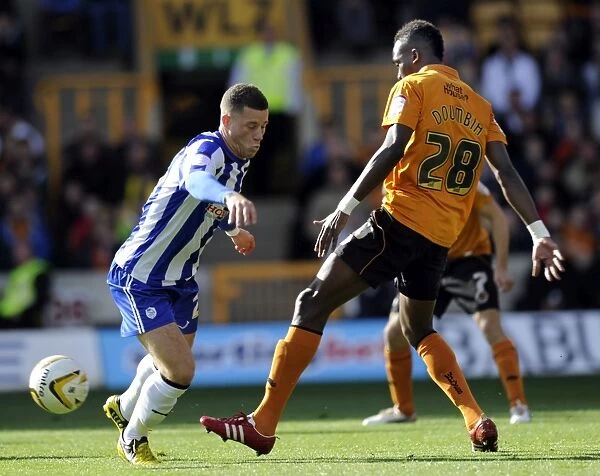 Wolverhampton v Sheffield Wednesday... Owls Ross Barkley with Wolves Tongo Doumbia