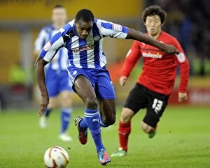 Cardiff Vs SWFC December 2nd 2012 Collection: Cardiff City v Sheffield Wednesday... Owls Michail Antonio gets away from Citys