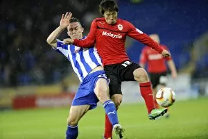 Images Dated 2nd December 2012: Cardiff City v Sheffield Wednesday... Owls David Prutton stops Citys Kim Bo-Kyung