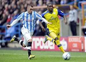 Images Dated 29th December 2012: Huddersfield Town v Sheffield Wednesday... Owls Jeremy Helan with Towns Jack Hunt