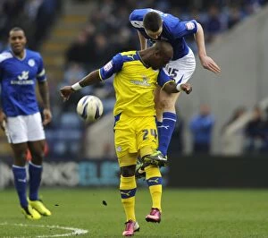 Leicester City vs SWFC March 9th 2013 Collection: Leicester City v Sheffield Wednesday... Citys Michael Kane over Leroy Lita