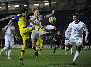 Images Dated 15th January 2013: MK Dons v Owls... Kieran Lee twarted by Dons Dean Lewington