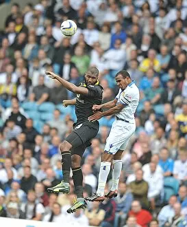 Images Dated 17th August 2013: Reda Johnnson jumps with Rodolph Austin