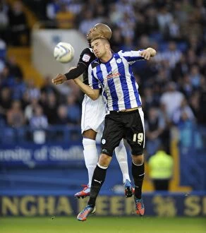 Images Dated 21st August 2012: Sheffield Wednesday v Birmingham City... Mark Beevers beats Marlon King