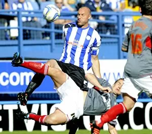 Images Dated 22nd September 2012: Sheffield Wednesday v Bolton... Martin Taylor beats Kevin Davies