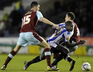 Sheffield Wednesday v Burnley... Owls Jeremy Helan brought down