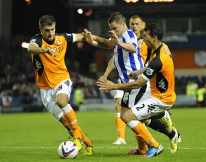 SHEFFIELD WEDNESDAY V FULHAM 2ND ROUND CAPITAL ONE CUP 28. 8. 12 Chris Maguire - Sheffield Wed BROUGHT DOWN BY Stephen Kelly - Fulham FOR PENALTYPIC : Martyn Harrison