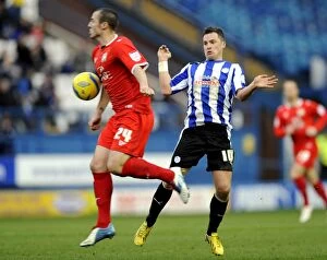Images Dated 5th January 2013: Sheffield Wednesday v MK Dons... Owls Chris Maguire with Anthony Kay