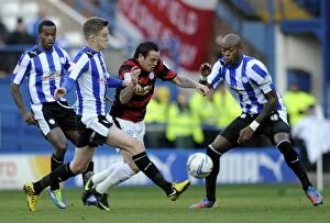 SWFC Vs Peterborough November 3rd 2012 Collection: Sheffield Wednesday v Peterborough... Lee Tomlin goes between Corry and Gardner