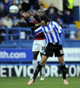 Sheffield Wednesday v Peterborough Utd... Owls Miguel Llera beats Posh Saido Berahino