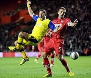 Images Dated 25th September 2012: Sheffield Wednesday v Southampton... Owls Chris Maguire feels the challenge of Saints Jos Hooiveld