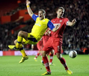 Sheffield Wednesday v Southampton... Owls Chris Maguire feels the challenge of Saints Jos Hooiveld