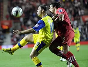 Images Dated 25th September 2012: Southampton v Sheffield Wednesday... Chris Maguire with Saints Jack Cork