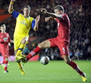 Southampton vs SWFC September 25th 2012 Collection: Southampton v Sheffield Wednesday... Chris Maguire with Saints Jos Hooiveld