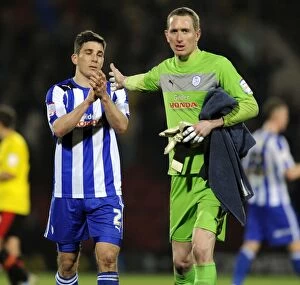 Images Dated 5th March 2013: Watford v Sheffield Wednesday... Dejected Owls pair of Lewis Buxton and keeper Chris